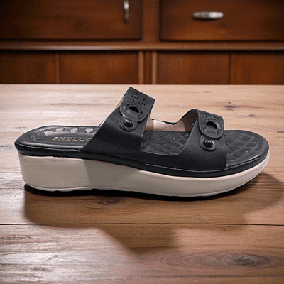 Trendy black double-strap slipper with cushioned sole & modern design, perfect for comfort + style